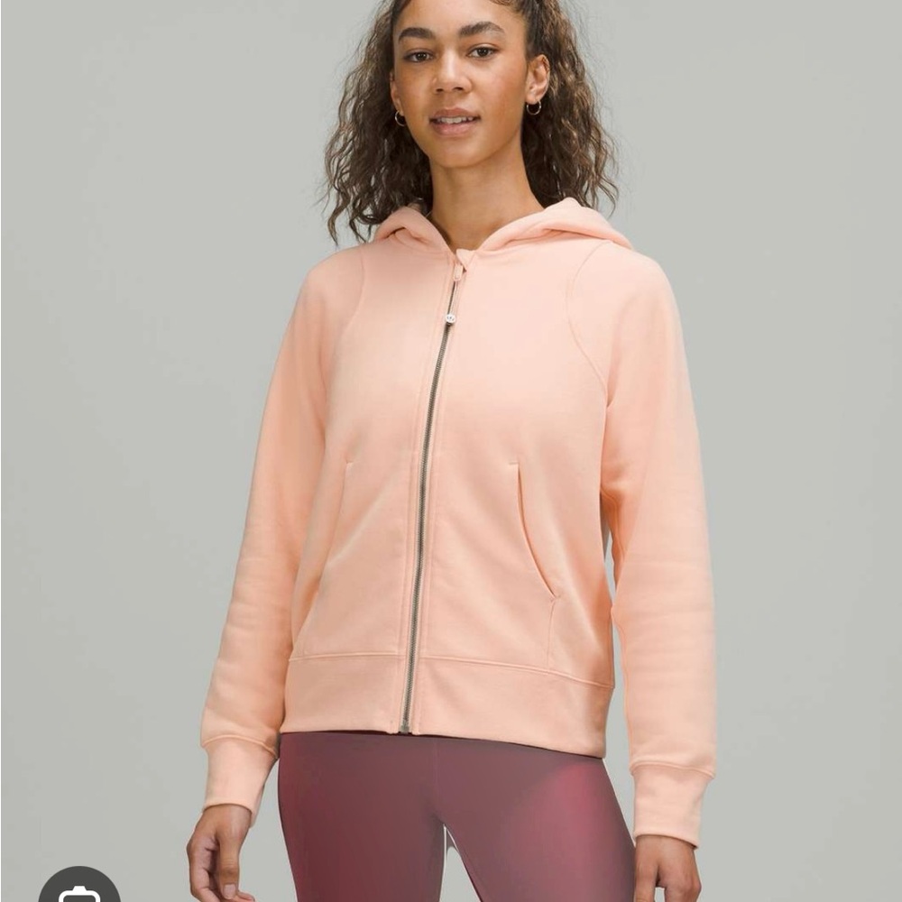Lululemon loungeful Hoodie in size 4 peach color